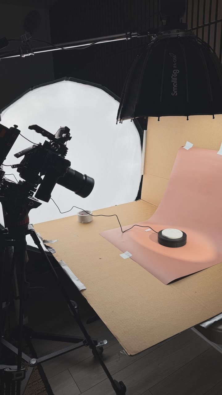 Studio set — cinema camera, softbox and paper sweep