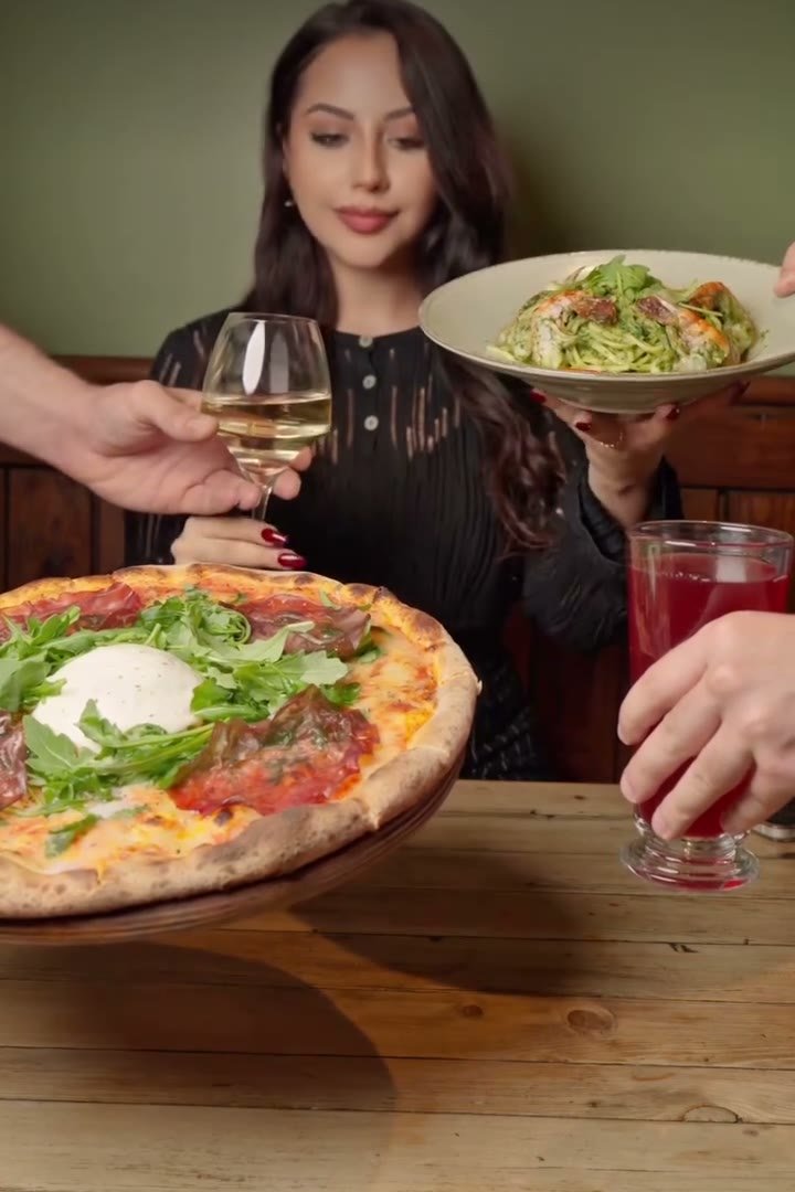 Nonnos Pizza — pizza and wine at the table